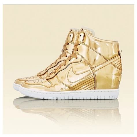 gold Nike sneakers